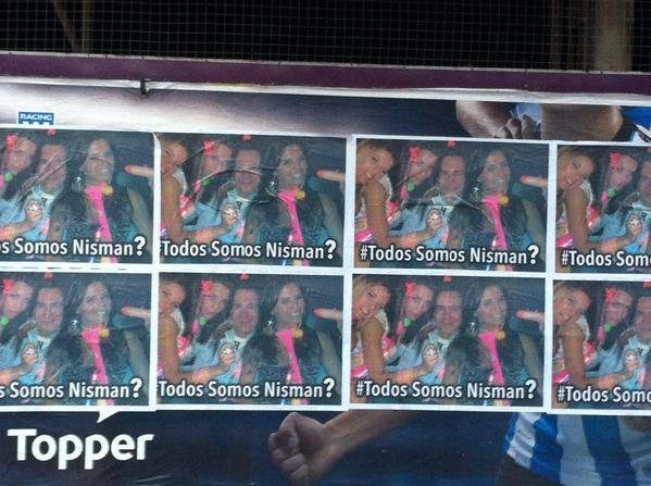 Aparecen afiches con una de las fotos filtradas de Nisman con mujeres