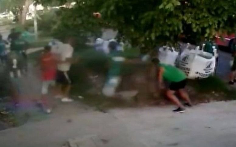 Pelea entre barras de Quilmes y Banfield