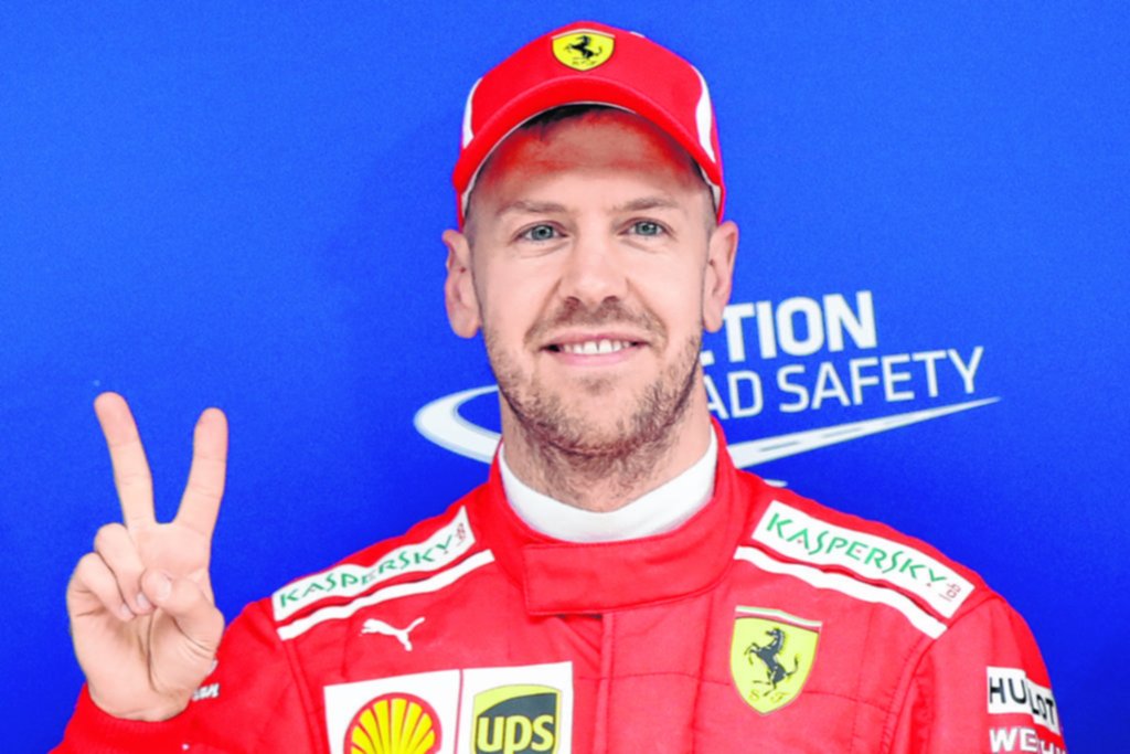 Vettel largaba en punta en el GP de China