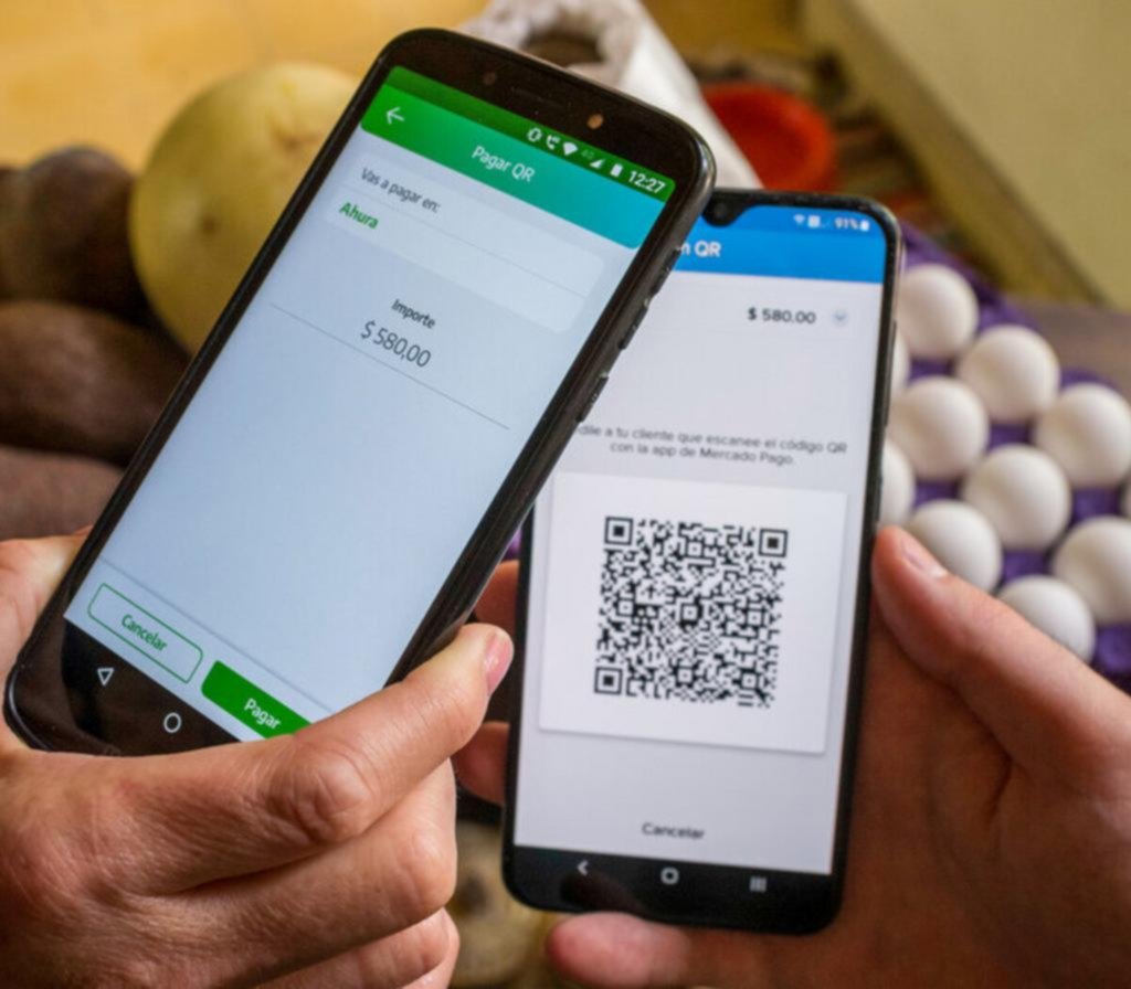 Extienden los pagos con QR en pesos y dólares para las tarjetas de débito