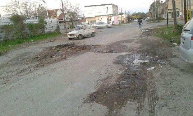 Quejas por baches en 159 entre 65 y 66