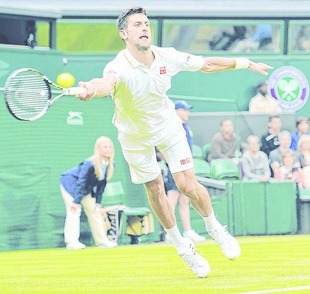 Pese a la lluvia continúan su marcha Djokovic y Federer