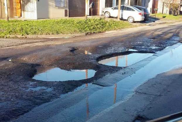 Terribles baches en 14 y 73