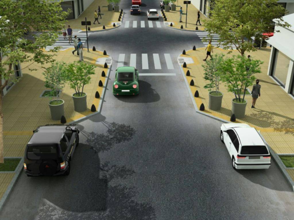 Veredas más anchas en las esquinas y zonas para las descargas en calle 12