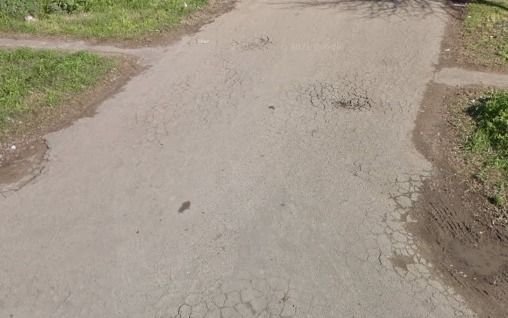 Bronca por el estado de la calle en 155 y 57 bis