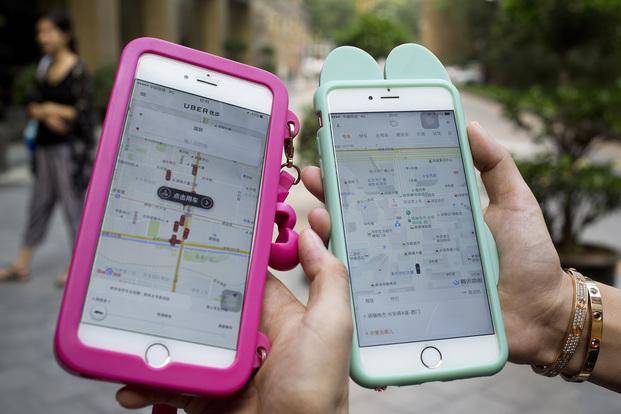 En China, Uber se fusiona con su principal competidor