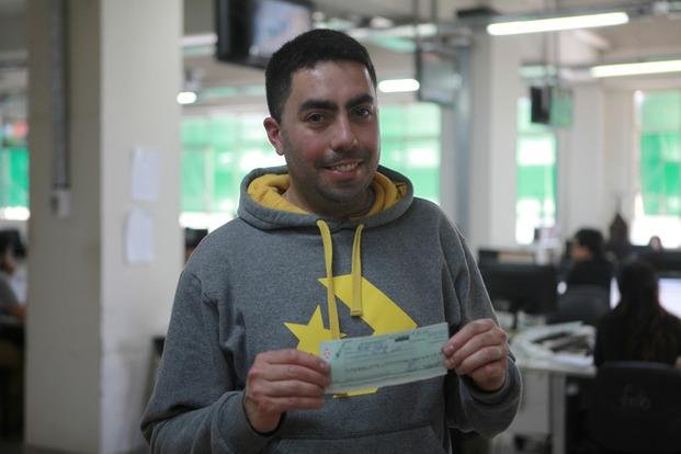 El cheque para un lector de Berisso