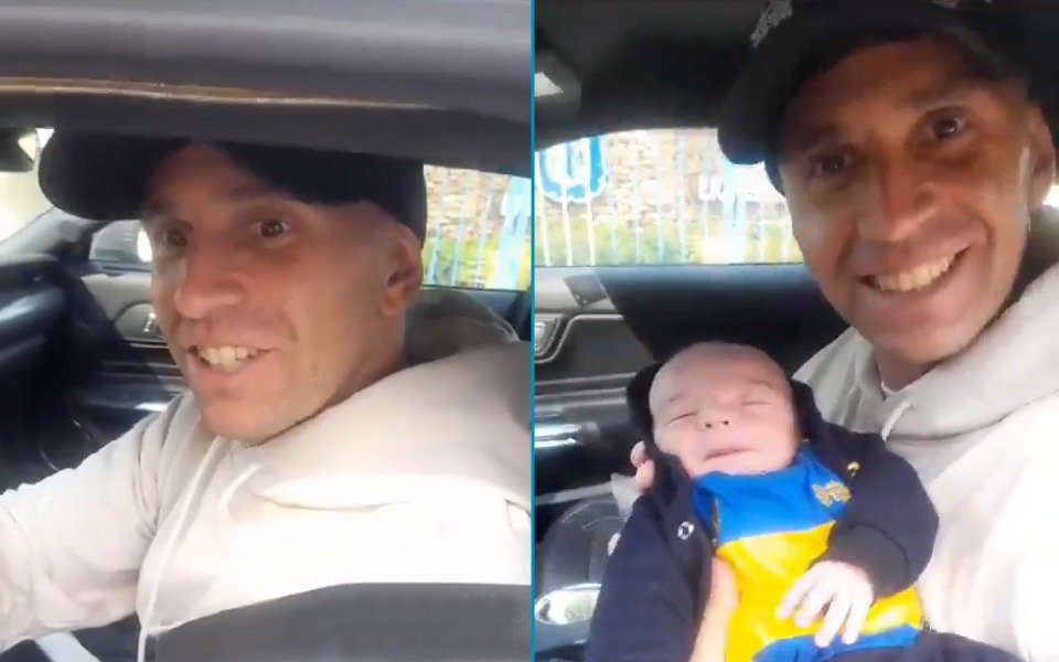 El Dibu Martínez compartió un rato con los hinchas en Ezeiza y hasta le "hizo upa" a un bebe