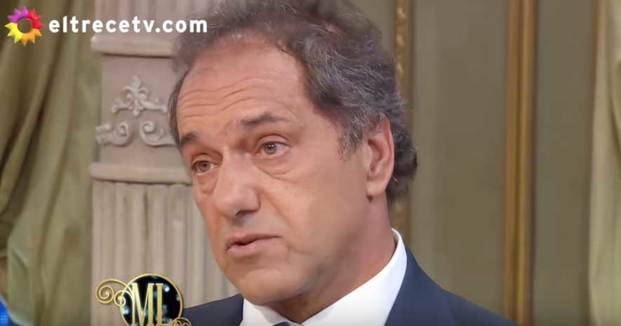 Video: padre del chico que mató 
a ladrón cruzó a Scioli en vivo