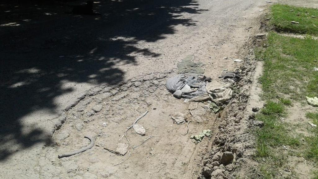 Un bache que complica a los vecinos de 146, 55 y 57