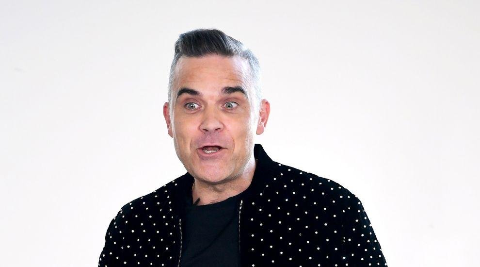 Robbie Williams le ganó litigio a Jimmy Page por una pileta