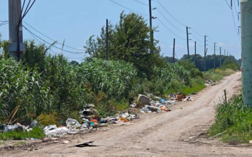 Reclamo por un basural y falta de iluminación en 515 y 191, Melchor Romero