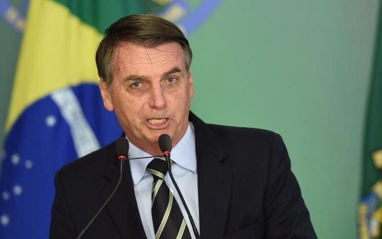 Con la polémica por su hijo mayor acusado de corrupción, Bolsonaro llega a Davos