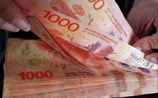 Bajan las tasas en licitación de bonos en moneda local